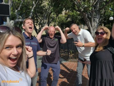 Happy team in a Strayboots team building scavenger hunts