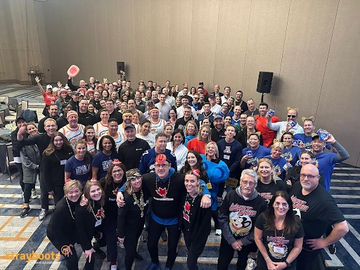 Leadership Retreats Corporate leadership team participating in outdoor adventure retreat and team-building activities in 2026